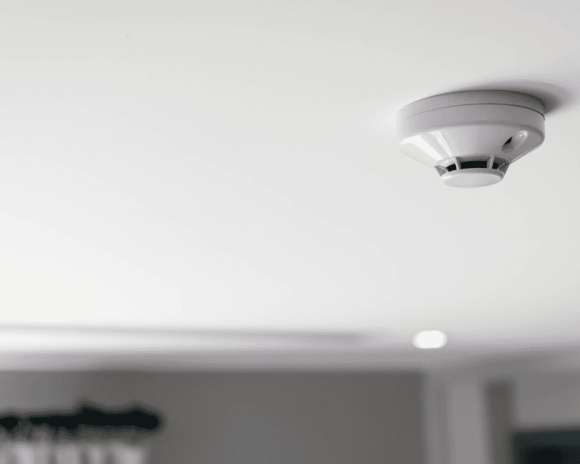 close on smoke alarm that attached on the ceiling of home