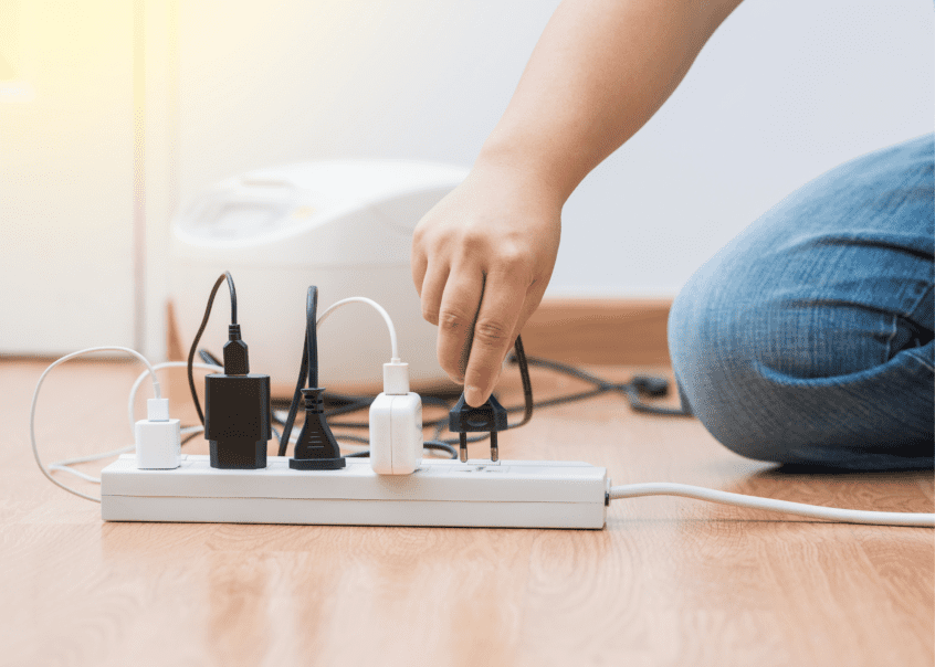 Image of multiple devices plugged into a power bar